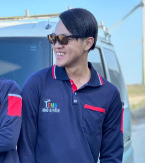 Portrait of James Wu, Project Manager, looking professional