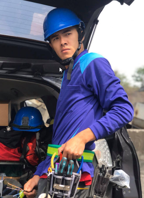 Portrait of Sarah Lin, Tech Director, smiling in office setting